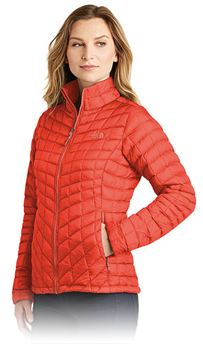Girl in Red Puffwer Jacket by Northface